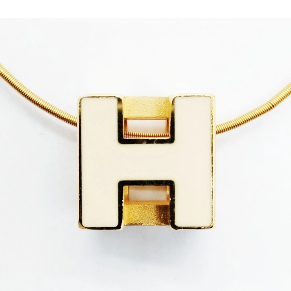 Jewelry - HERMES Gold and Cream Pendant Necklace PREOWNED